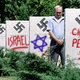 Illustration for article titled Nazi SS Cemetery Desecrated By Pro-Semitic Graffiti